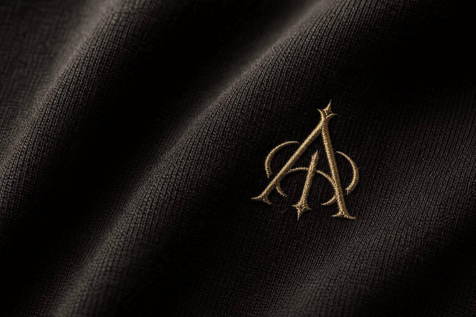 ALTIOR gold embroidered monogram on heavyweight cotton